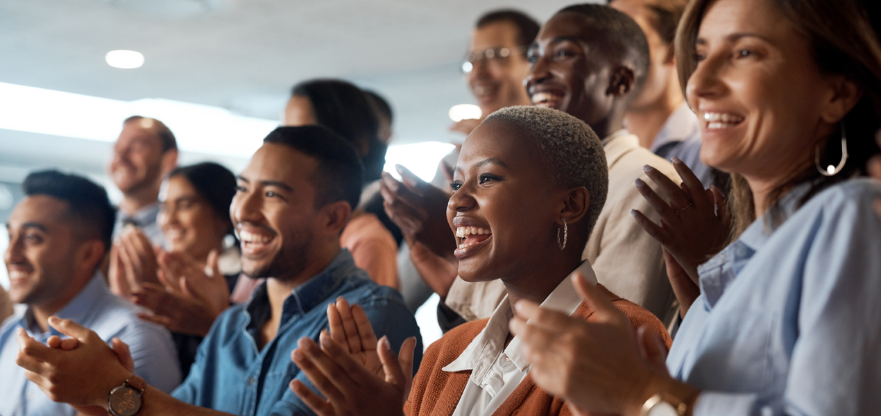 A group of colleagues cheering.